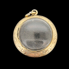 Load image into Gallery viewer, Victorian 9ct Gold Enamel, Pearl and Garnet Glazed Back Pendant showing the back, on a black background
