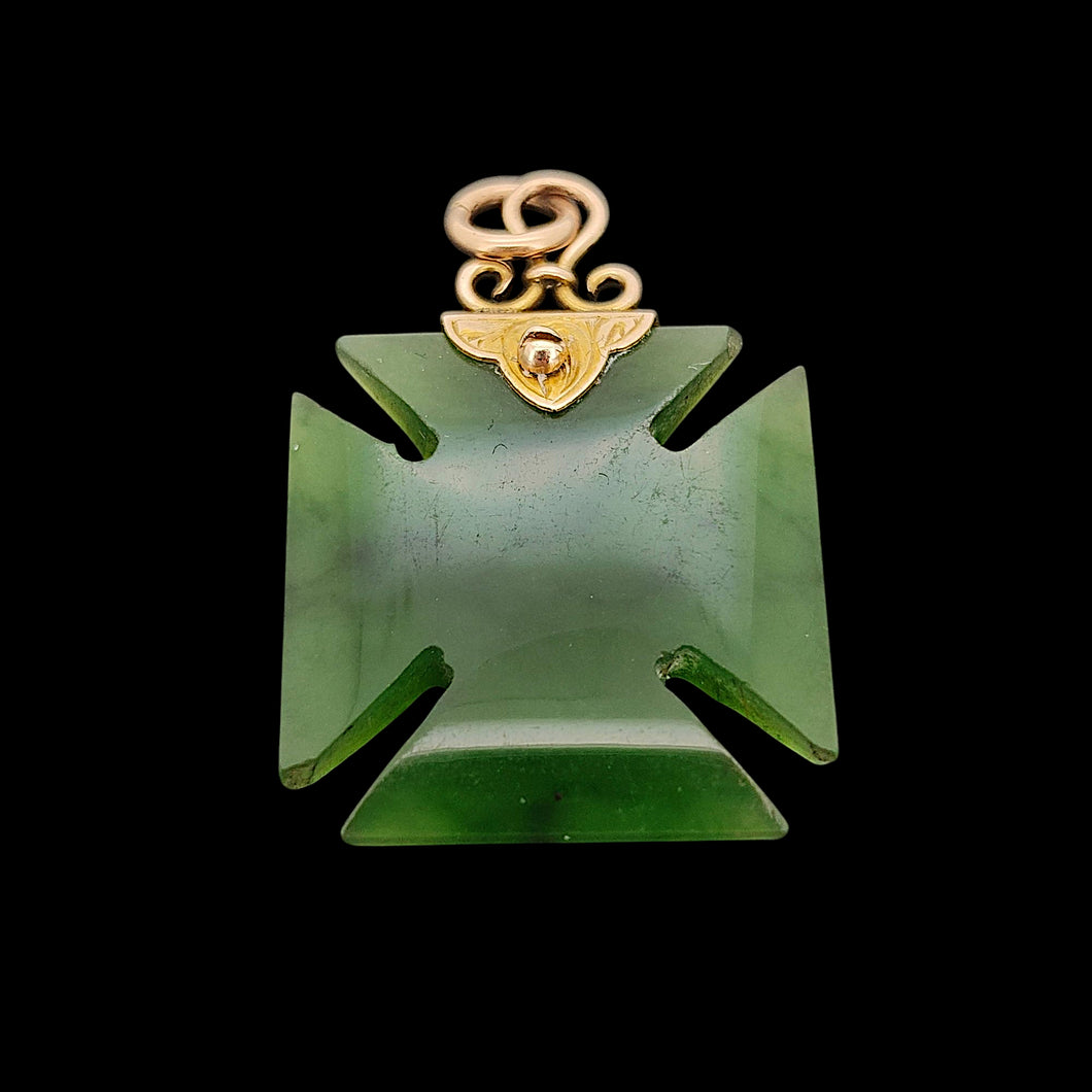 Victorian 9ct Gold Nephrite Jade Cross Pattée Pendant on a black background