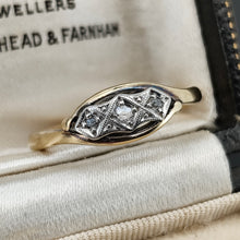 Load image into Gallery viewer, A three stone rose cut diamond ring in yellow gold and palladium, in a ring box
