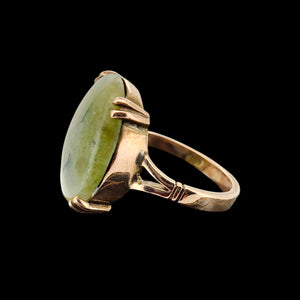 Vintage 9ct Rose Gold Nephrite Jade Statement Ring shown from the side, on a black background