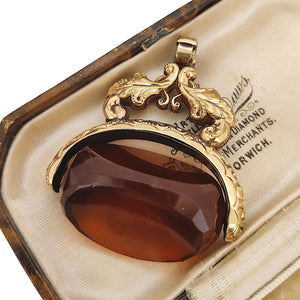 Large Antique 9ct Gold Cased Orange Glass Spinner Fob in box