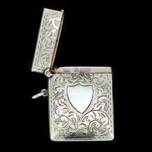 Load image into Gallery viewer, A silver rectangular engraved vesta case with a shield cartouche, lid open

