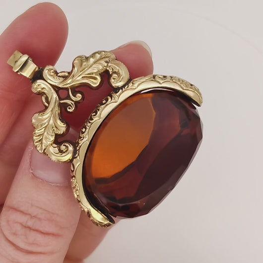 Large Antique 9ct Gold Cased Orange Glass Spinner Fob video