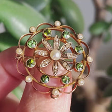 Load and play video in Gallery viewer, Art Nouveau 9ct Yellow Gold Peridot and Seed Pearl Flower Brooch/Pendant
