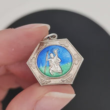 Load and play video in Gallery viewer, Vintage Silver and Enamel Saint Christopher Travel Charm Pendant, Circa 1970
