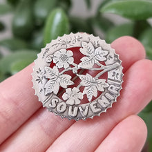 Load image into Gallery viewer, Antique Silver Souvenir Flower Brooch in hand
