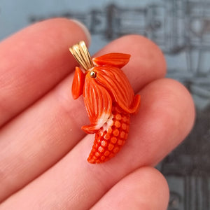 Vintage 9ct Gold Coral Corn Pendant in hand