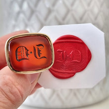 Load image into Gallery viewer, Victorian Gold Cased Carnelian Fob Seal | Initials J.D in hand with wax impression
